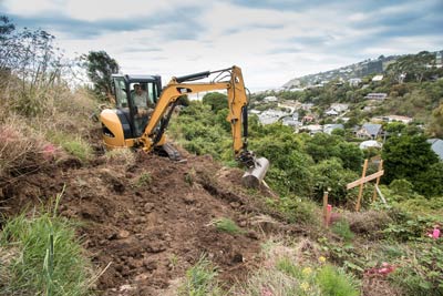 Excavator on hill